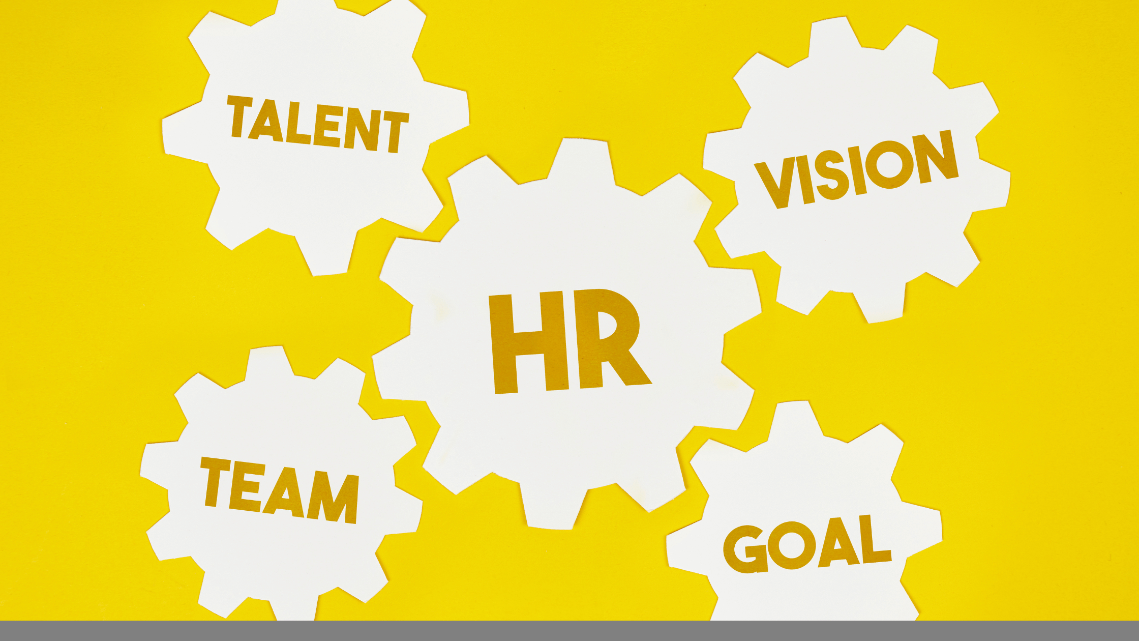 gears with hr talent team goal and vision written on them